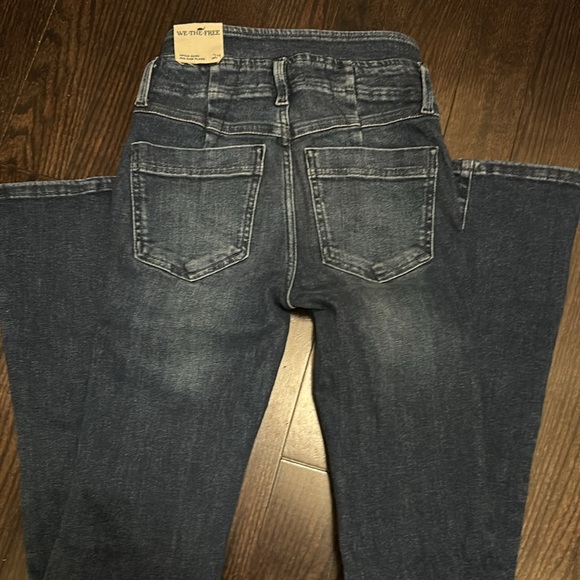 We the Free high waisted button front flare jeans.  Size 24 - Picture 7 of 9